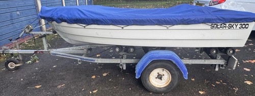 Boat trailer and two petrol - boat,,